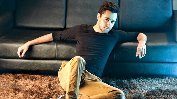Imran Khan sitting on floor