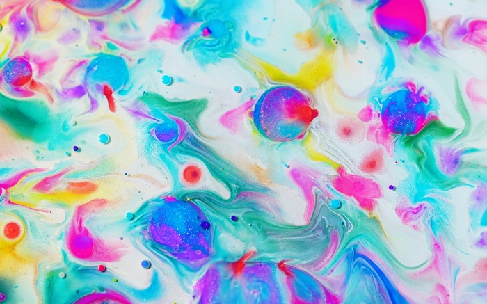 Colorful abstract paint swirls and bubbles