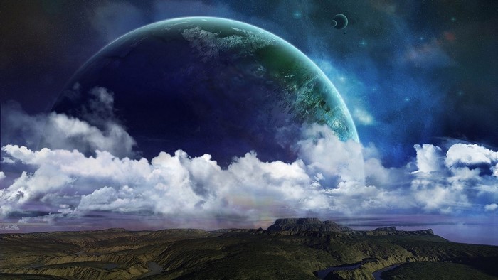 Planet with clouds over mountains