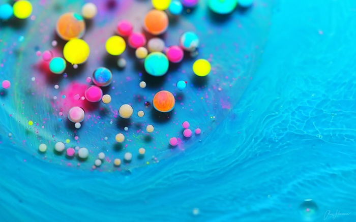 Colorful liquid with floating colorful balls