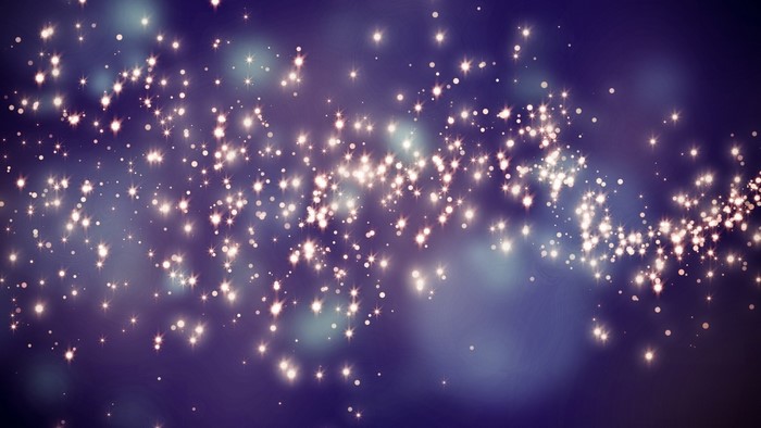 Sparkling lights on a dark blue background