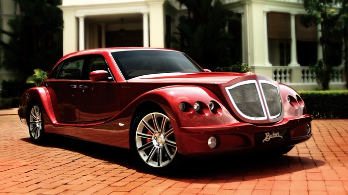 Red Bufori Geneva Classic car parked on brick driveway
