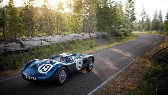 Jaguar C Type classic race car on winding road