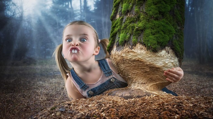 Naughty Girl Making Funny Face in Forest