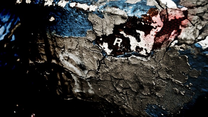 Rockstar Games logo on cracked surface