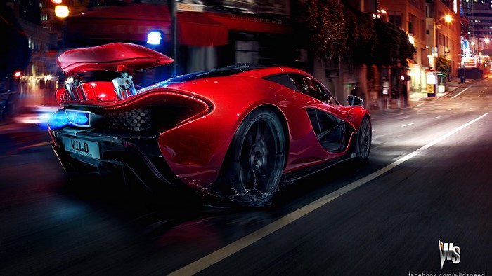 Red McLaren P1 Super Sports Car Driving at Night
