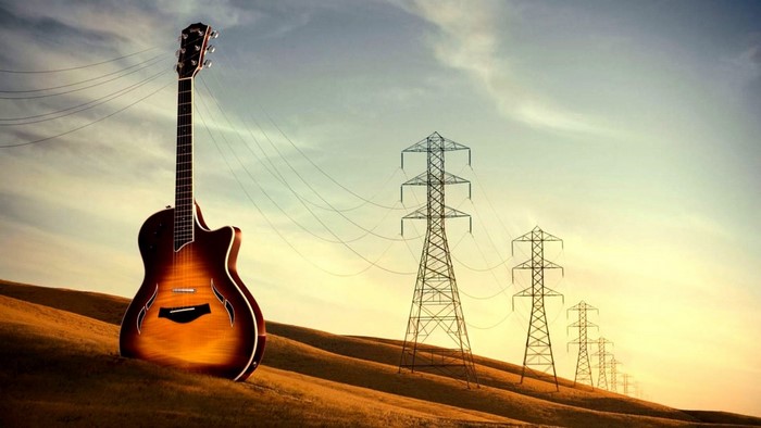 Acoustic guitar connected to power lines