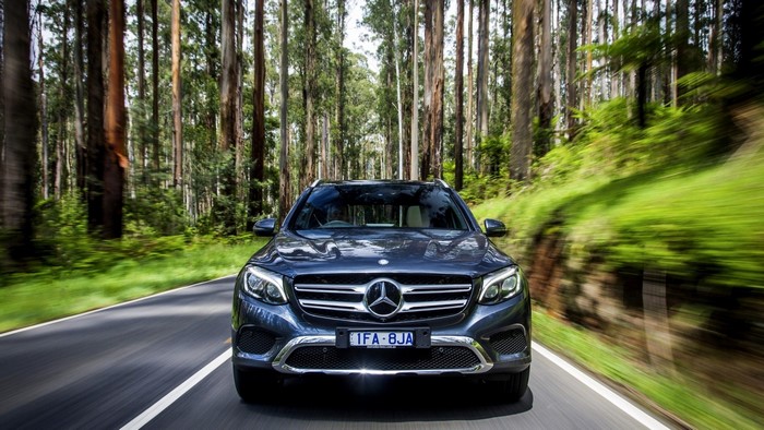 Mercedes-Benz GLC driving on a forest road