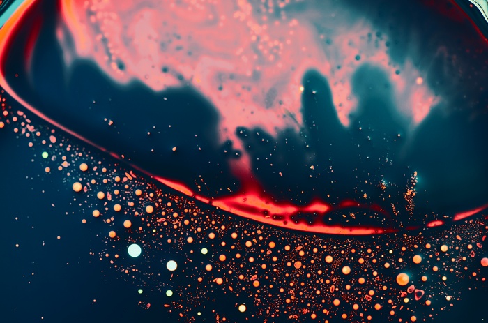 Liquid metal with red and blue swirls 4K