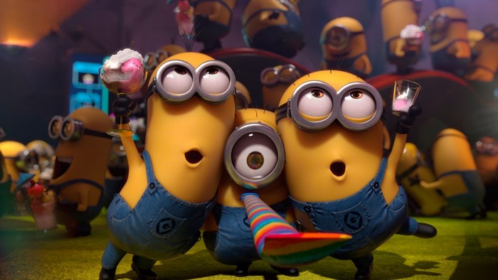Minions celebrating with drinks and party blower