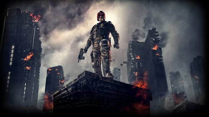 Judge Dredd standing on a building
