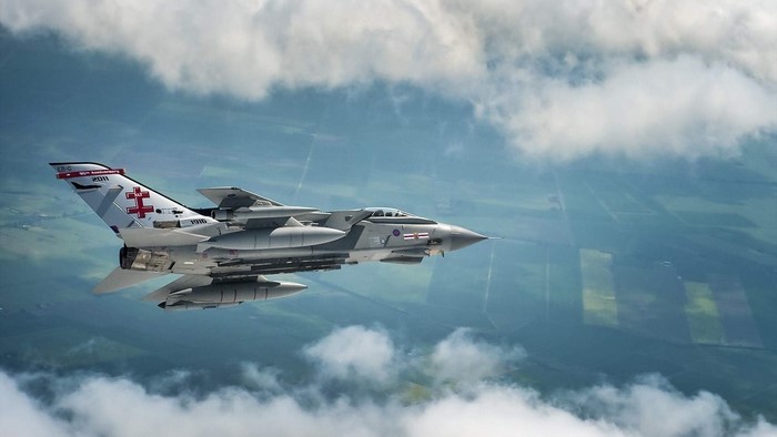 Panavia Tornado aircraft flying through clouds