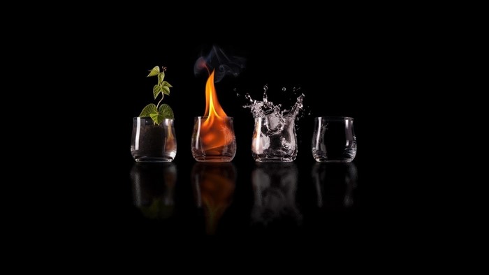 The Four Elements: Earth, Fire, Water, and Air in Glasses