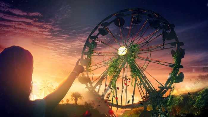 A person reaches for an overgrown Ferris wheel at sunset