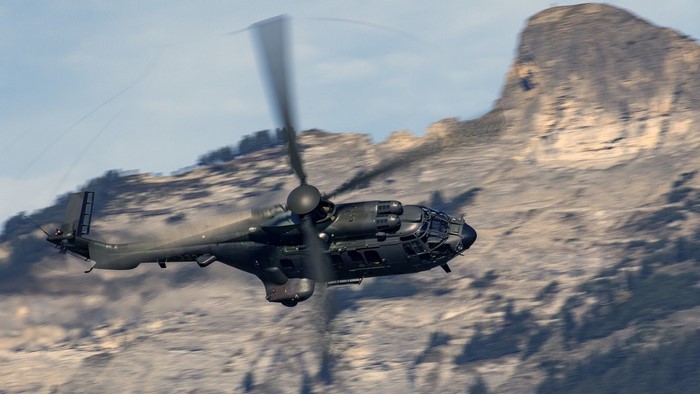 Super Puma Army Helicopter in Mountains