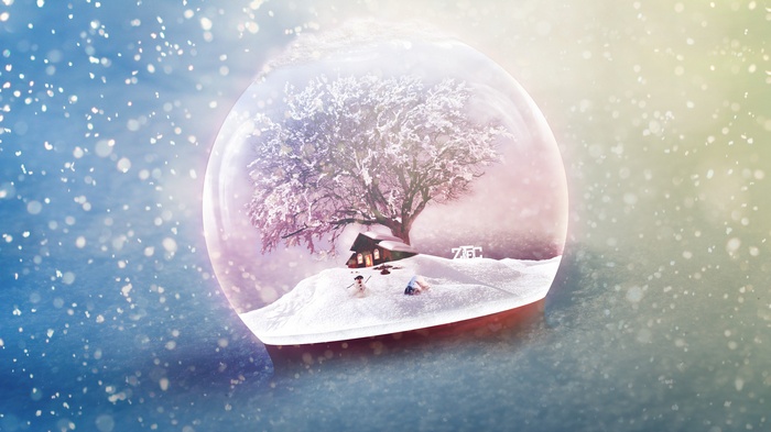 Snow globe with winter scene and falling snow
