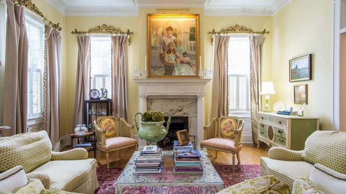 Living room with fireplace and family portrait