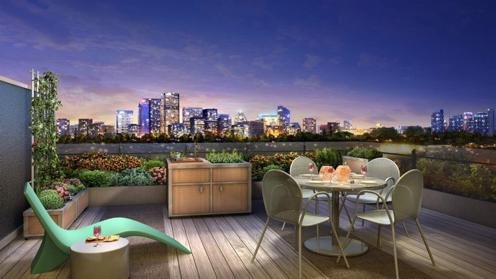 Rooftop Terrace with Cityscape View at Night