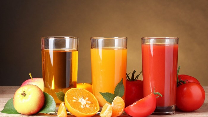 Three glasses of fresh juice with fruits and vegetables