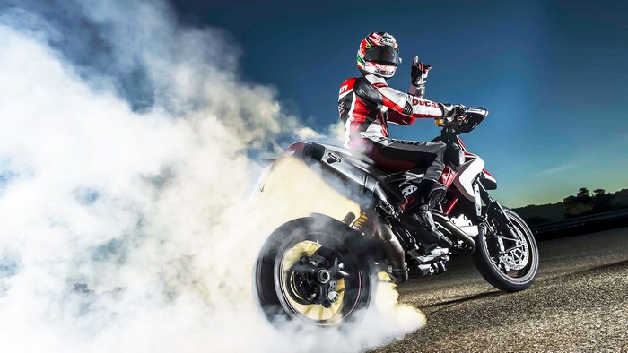 Ducati Hypermotard SP motorcycle doing a burnout