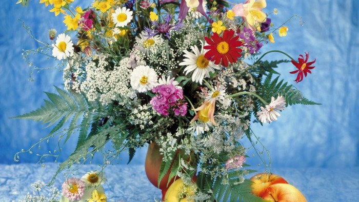 Colorful Wildflowers in a Vase with Apples