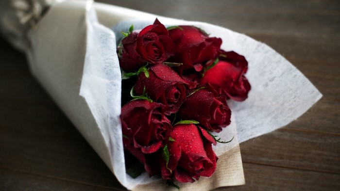 Bouquet of red roses with water droplets