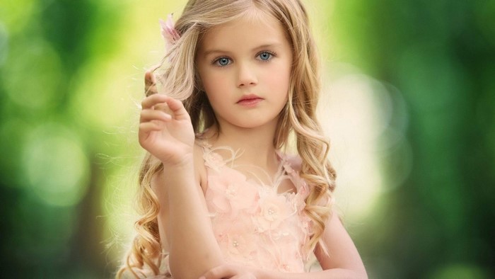 Cute girl with blonde hair and blue eyes