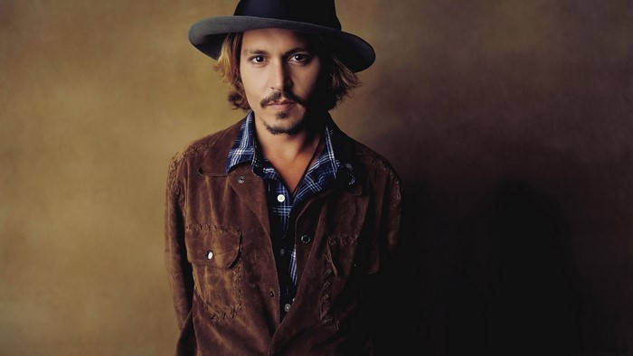 Johnny Depp wearing a hat and jacket