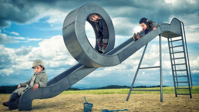 Children on a playground slide