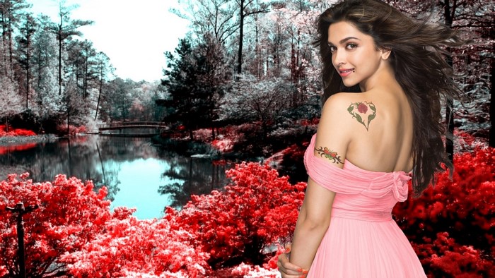 Deepika Padukone in a pink dress with tattoos