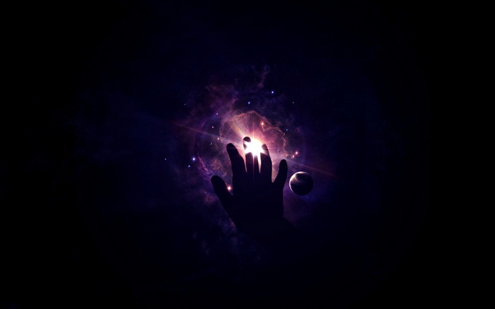 Hand reaching into a vibrant nebula with stars and a planet