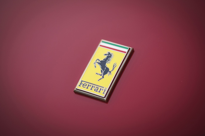 Ferrari Logo on Red Surface