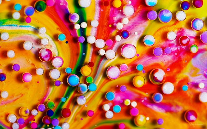 Colorful abstract fluid art with bubbles