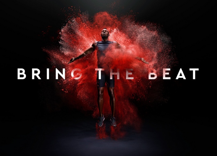Usain Bolt with red powder explosion