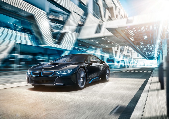 4K Black BMW i8 driving on a road