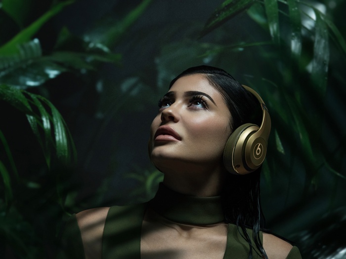 Kylie Jenner with Beats headphones in jungle