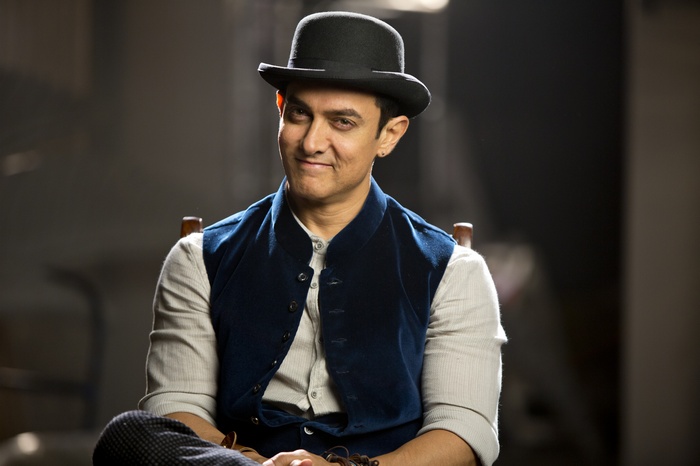Aamir Khan wearing a bowler hat and vest