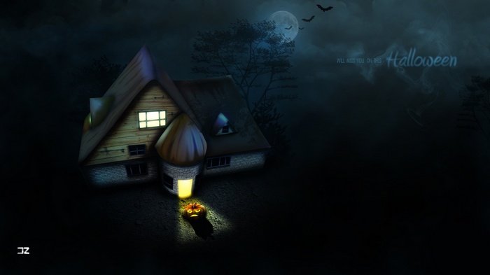 Haunted house with pumpkin and bats on Halloween night