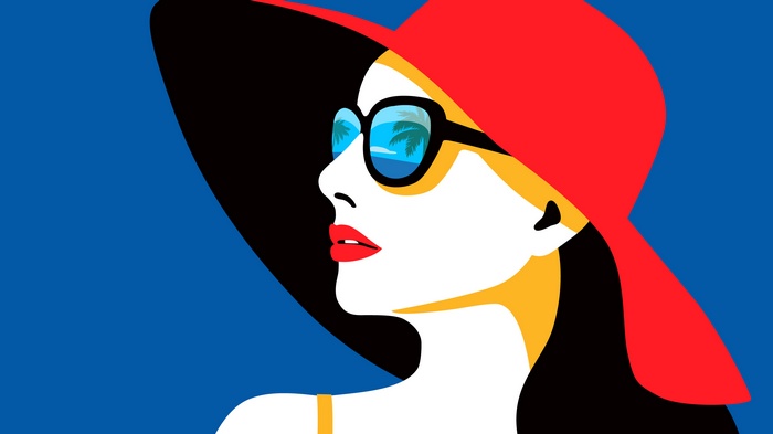Woman in a red hat and sunglasses