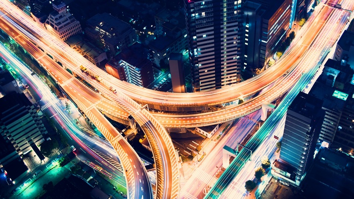 Highway junction in Tokyo at night, aerial view, 4K