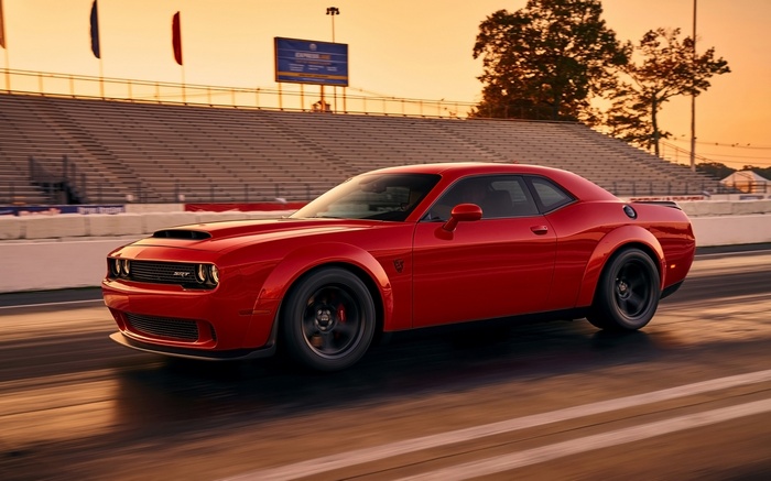 Red Dodge Challenger SRT Demon on a race track
