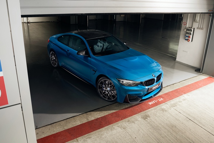 BMW M4 Coupe Competition in a garage