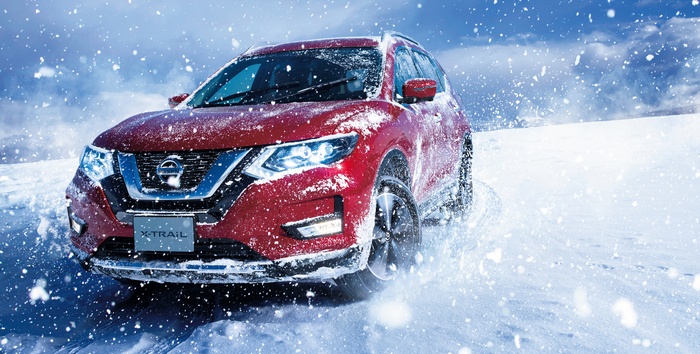 Red Nissan X-Trail driving in snow 4K