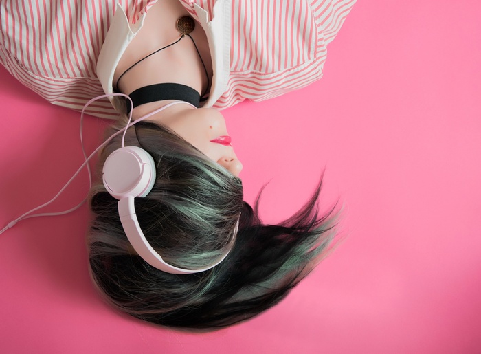 Woman with Headphones and Striped Shirt