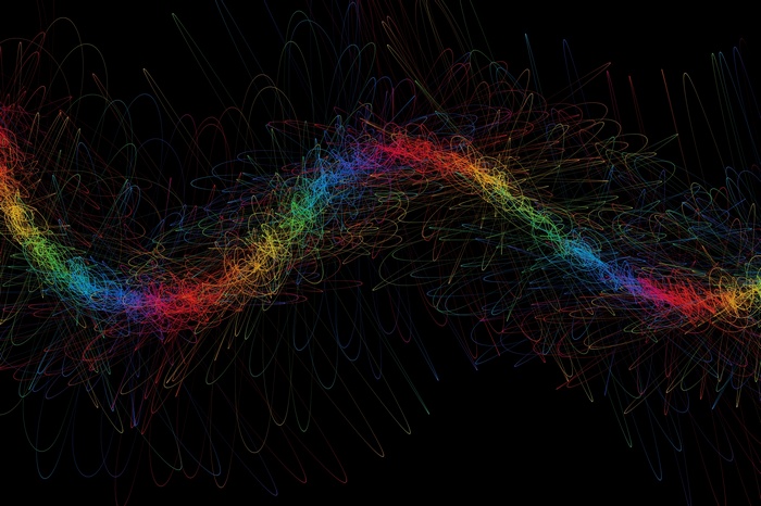 Abstract rainbow-colored scribbles on black background