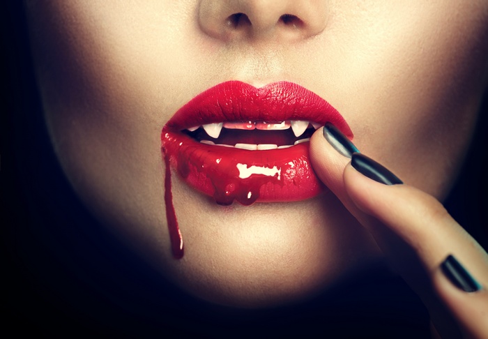 Vampire with red lips and blood 4K