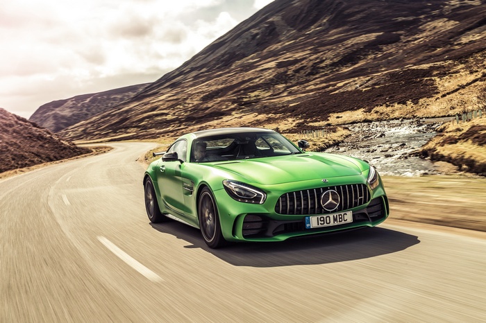 Green 2018 Mercedes-AMG GT R driving on a road