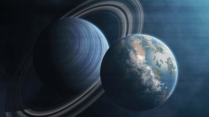 Ringed planet and Earth-like planet in space