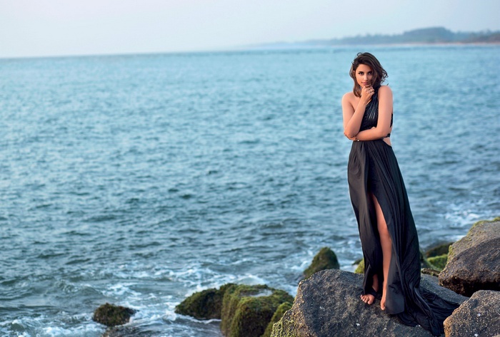 Parineeti Chopra on rocks by the sea
