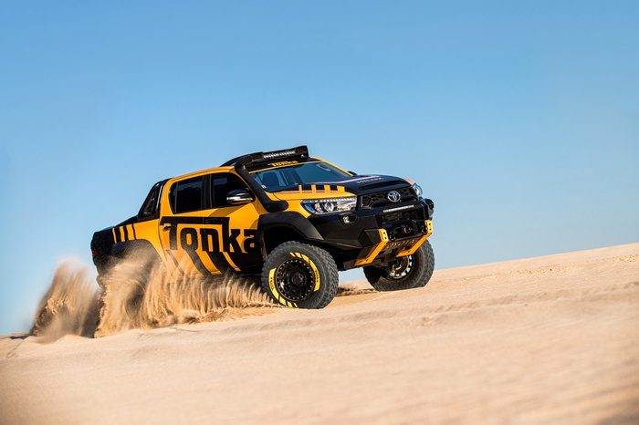 Toyota Hilux Tonka concept truck off-roading in sand dunes